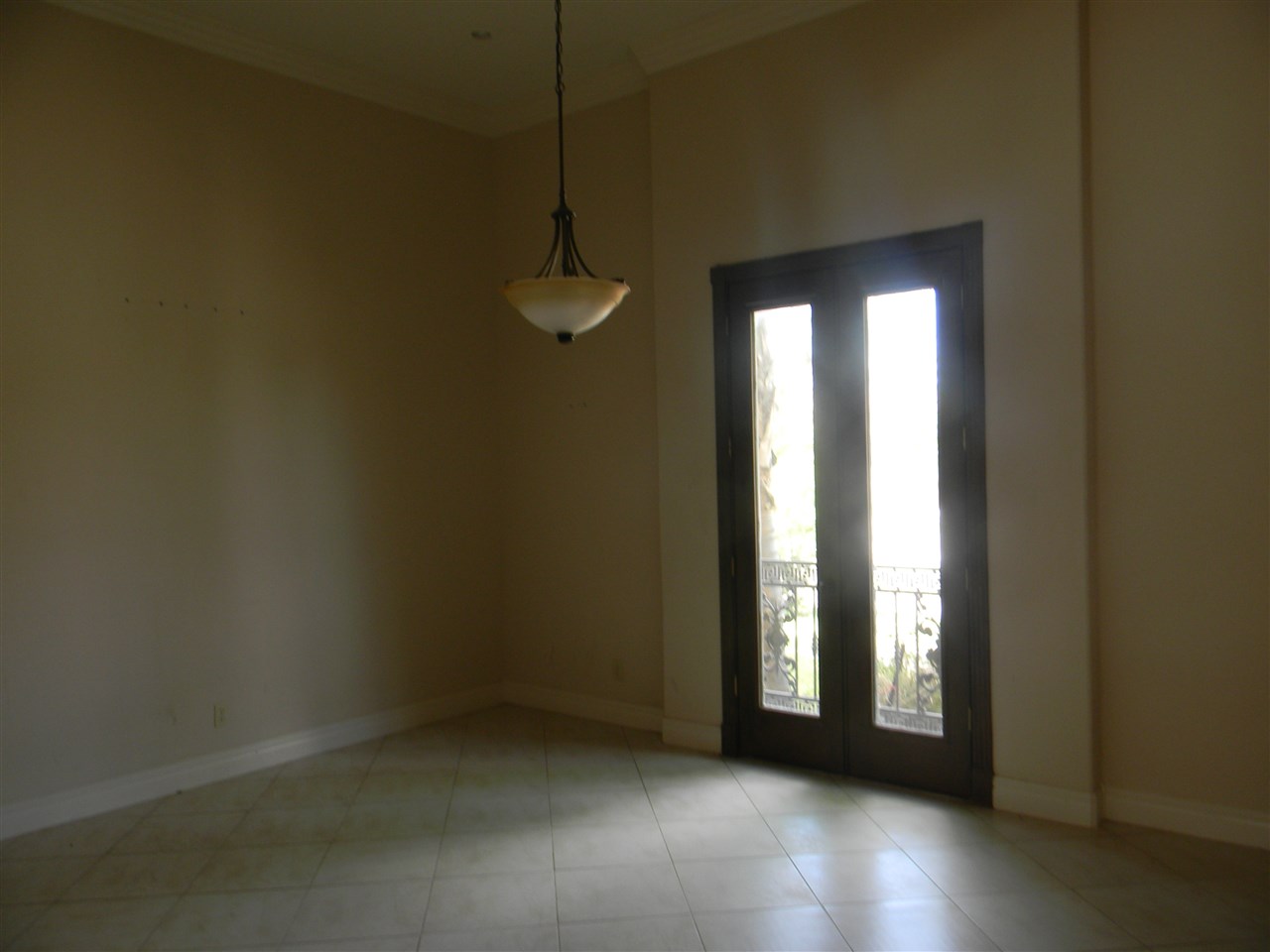205 Lake Como Road Laredo, TX 78041 - Photo 14 of 20 a view of an empty room with window and hardwood floor