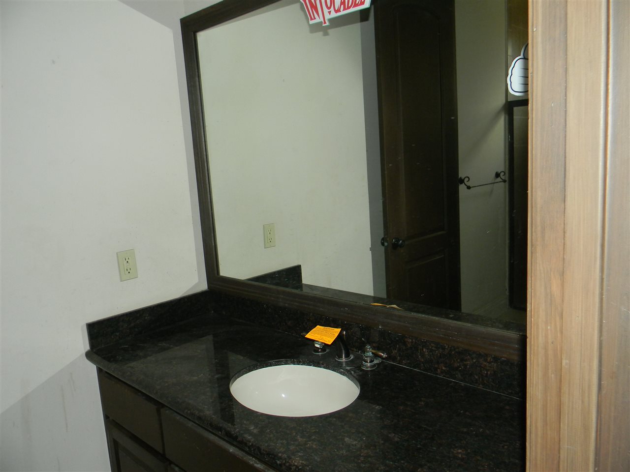 205 Lake Como Road Laredo, TX 78041 - Photo 9 of 20 a bathroom with a sink and a mirror