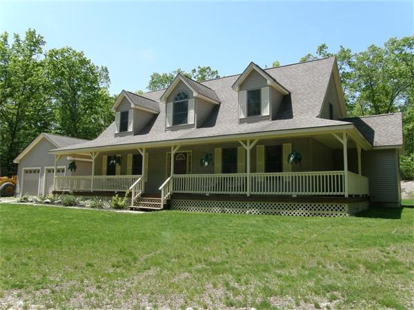 111 Pierpont Road Dudley, MA 01571 - Photo 1 of 30 a view of a house with a yard and sitting area