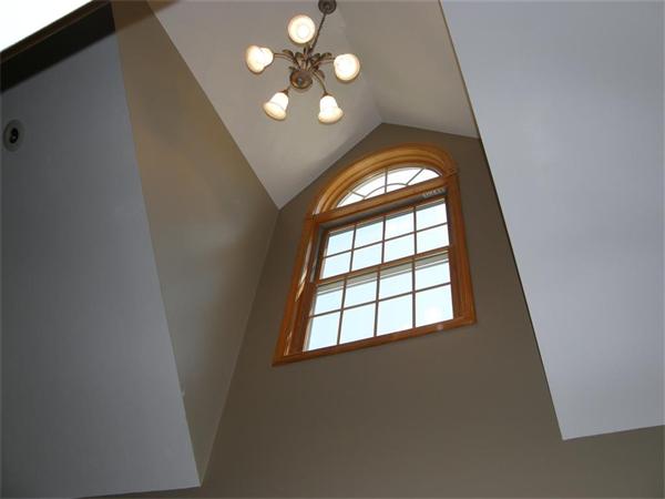 111 Pierpont Road Dudley, MA 01571 - Photo 14 of 30 an empty room with windows and mirror