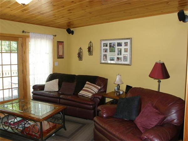 111 Pierpont Road Dudley, MA 01571 - Photo 17 of 30 a living room with furniture and a window