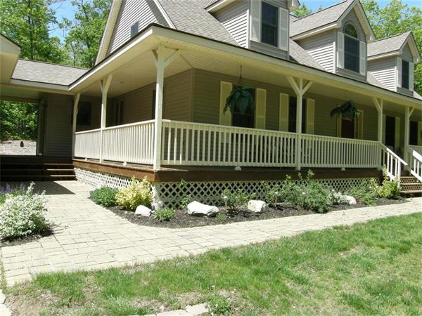 111 Pierpont Road Dudley, MA 01571 - Photo 5 of 30 a view of a house with a yard