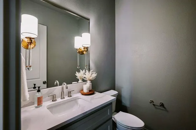 a bathroom with a sink and a toilet