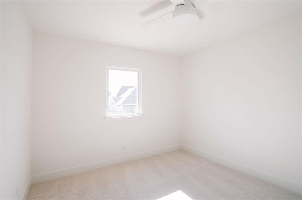 405 Kestrel Court Aledo, TX 76008 - Photo 25 of 31 an empty room with a window