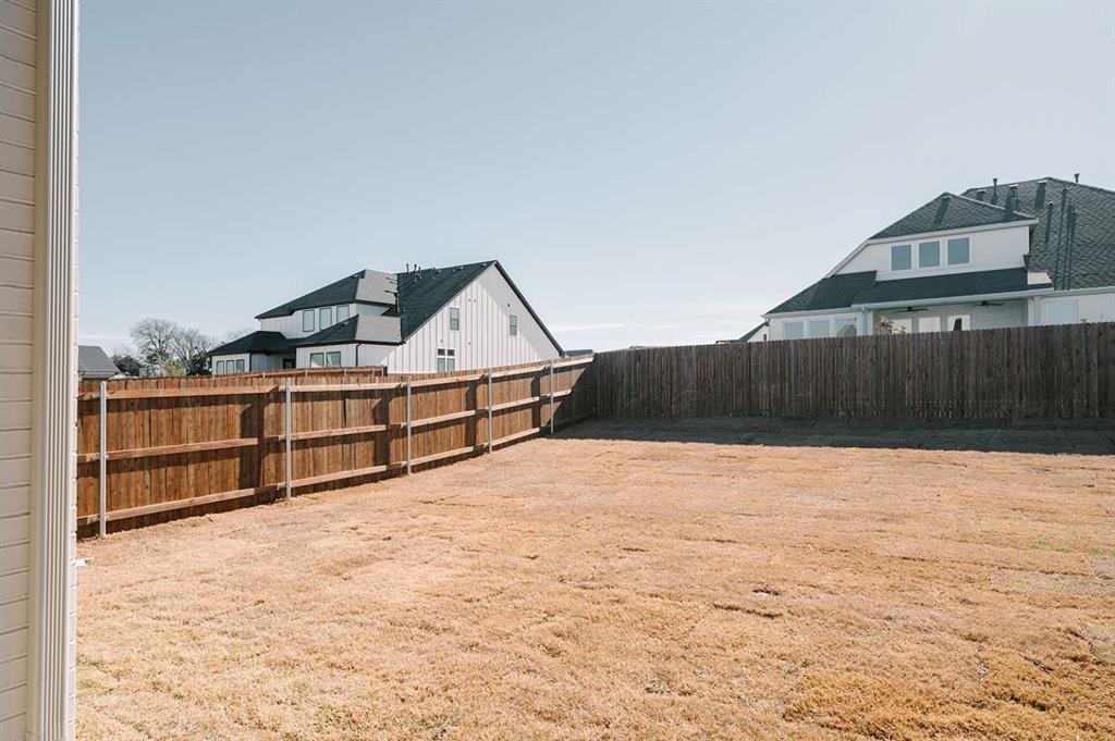 405 Kestrel Court Aledo, TX 76008 - Photo 29 of 31 a view of backyard of house