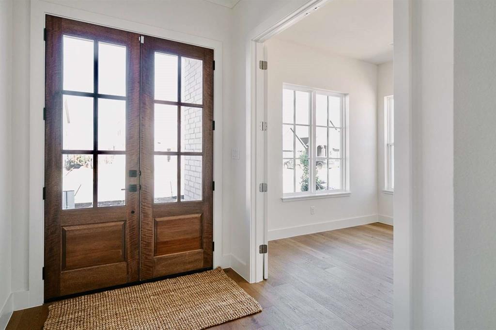 405 Kestrel Court Aledo, TX 76008 - Photo 9 of 31 a view of an empty room and window