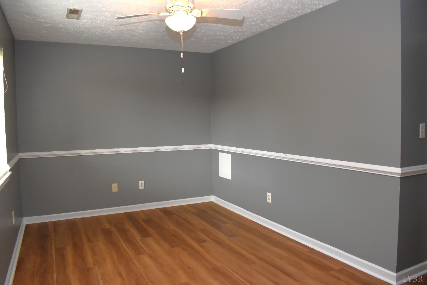 482 Oak Point Road Forest, VA 24551 - Photo 28 of 39 a view of an empty room with wooden floor
