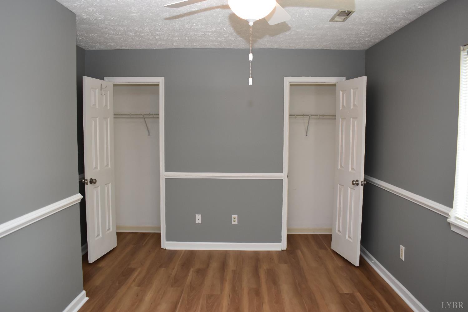 482 Oak Point Road Forest, VA 24551 - Photo 30 of 39 an empty room with wooden floor and closet