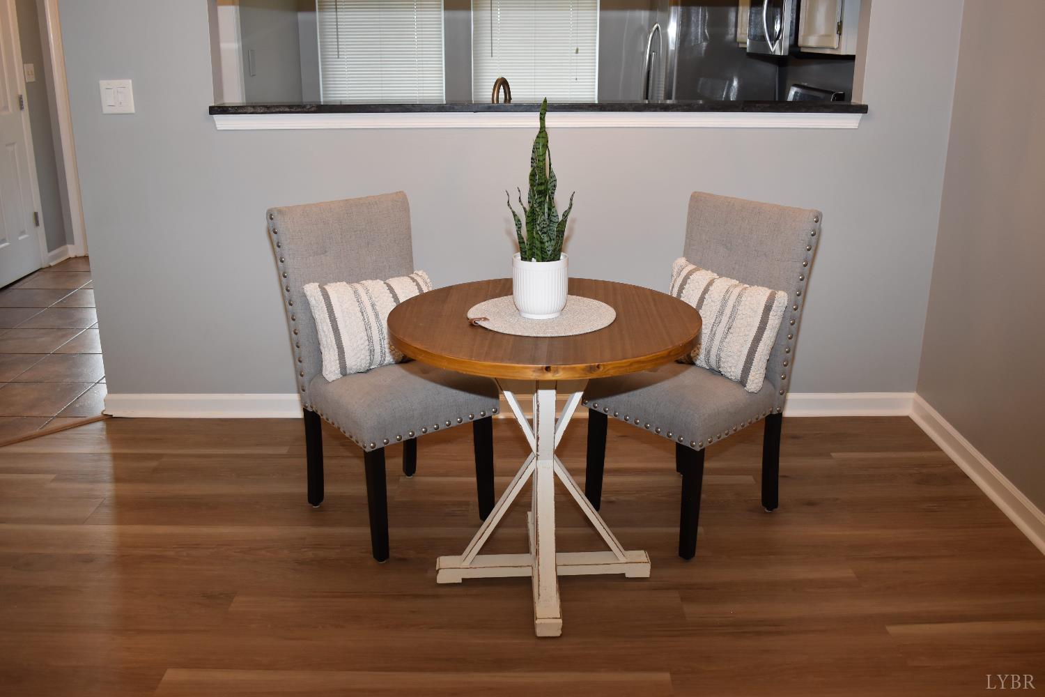 482 Oak Point Road Forest, VA 24551 - Photo 4 of 39 a view of a dining room with furniture and wooden floor