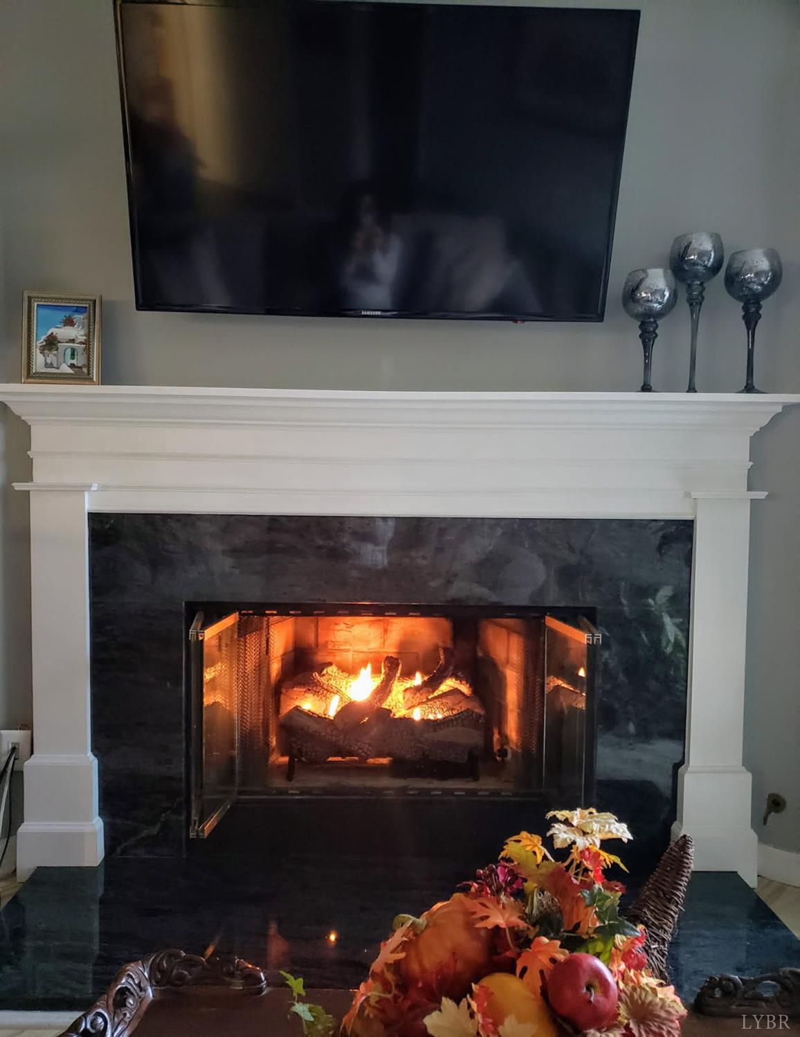 482 Oak Point Road Forest, VA 24551 - Photo 8 of 39 a room with furniture and a fireplace