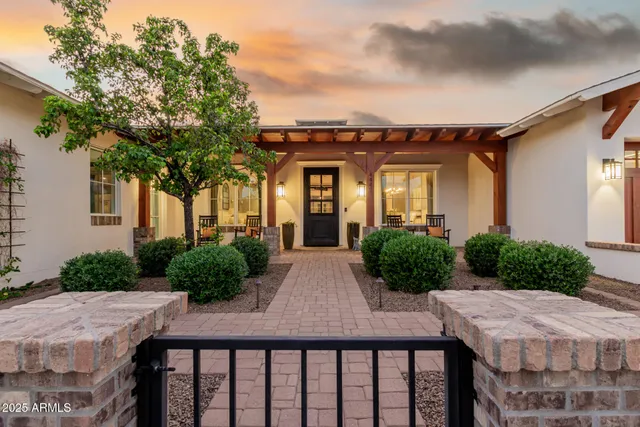 a spacious bedroom with a bed and furniture