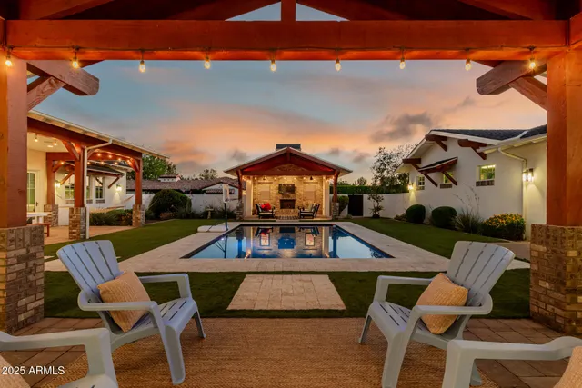 a spacious bedroom with a large bed and a window
