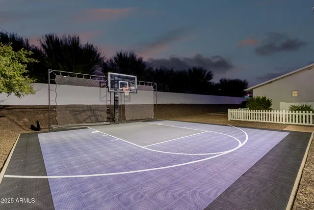 a utility room with sink dryer and washer