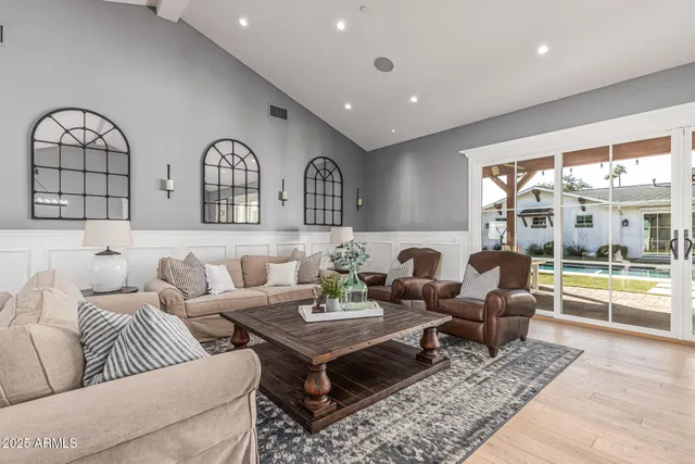 a view of a city street with tall buildings