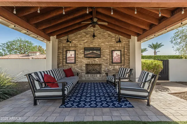 a en suite bathroom with a tub sink and mirror