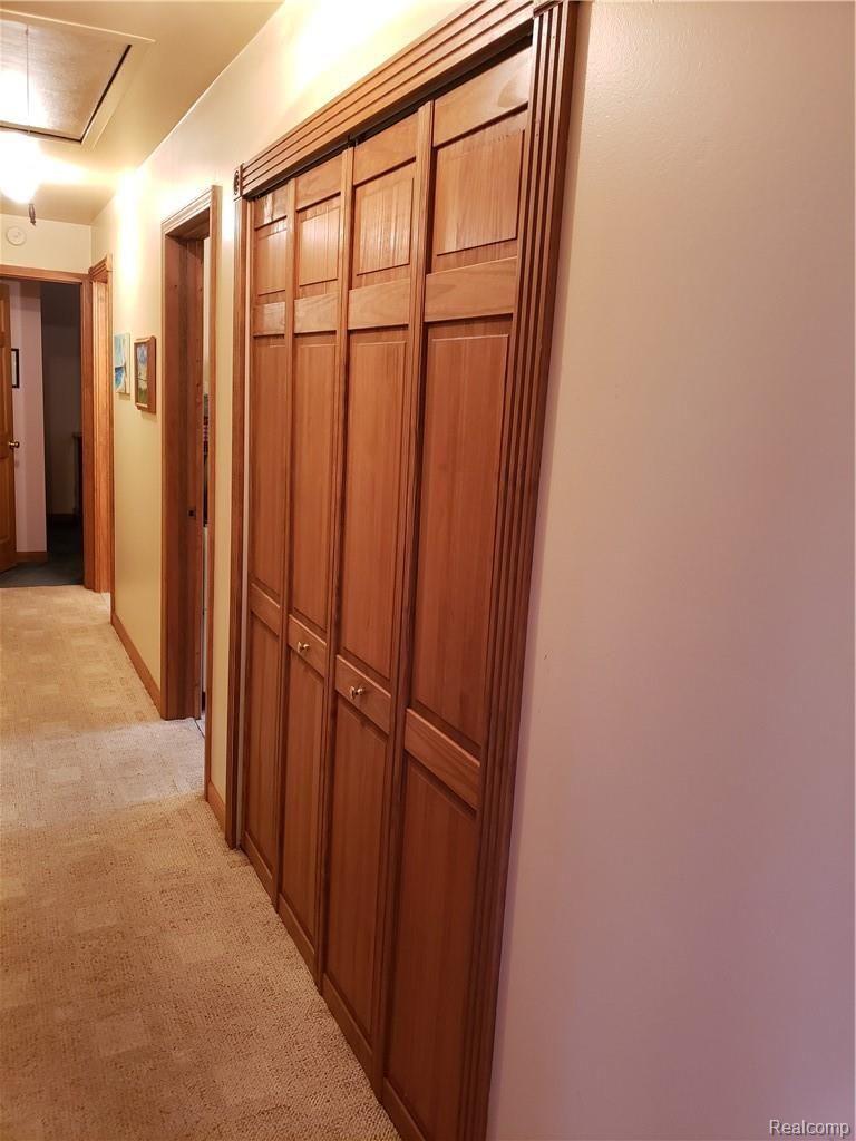 5110 Eagle Road White Lake, MI 48383 - Photo 12 of 14 hall closet and pull down stair.jpg