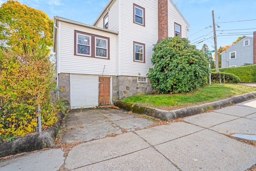 39 Range Road Boston, MA 02124 - Photo 22 of 25 a view of a house with a yard