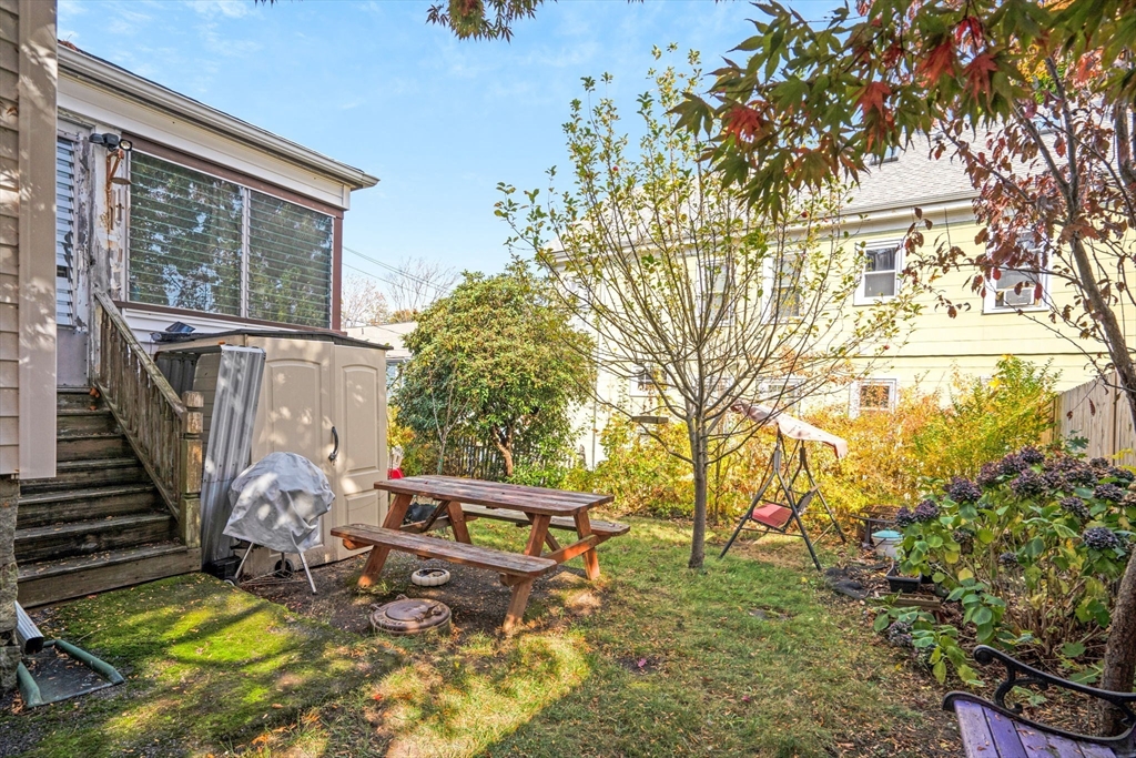 39 Range Road Boston, MA 02124 - Photo 25 of 25 a view of roof deck with wooden floor and seating space