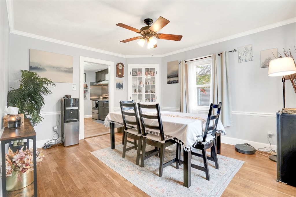 39 Range Road Boston, MA 02124 - Photo 3 of 25 a view of a dining room with furniture and wooden floor