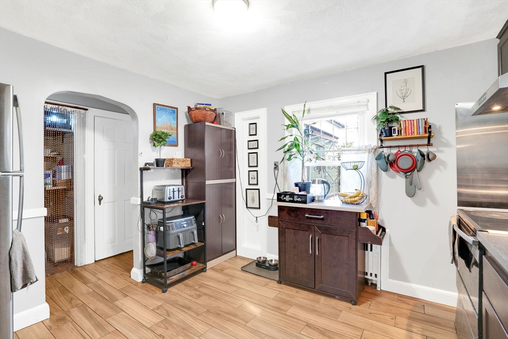 39 Range Road Boston, MA 02124 - Photo 7 of 25 a room with furniture and wooden floor