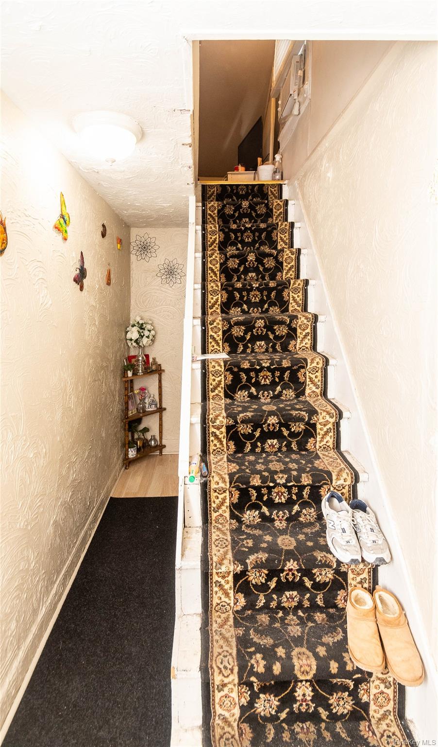 46 Hasbrouck Street Newburgh, NY 12550 - Photo 19 of 26 walk in closet with wooden floor