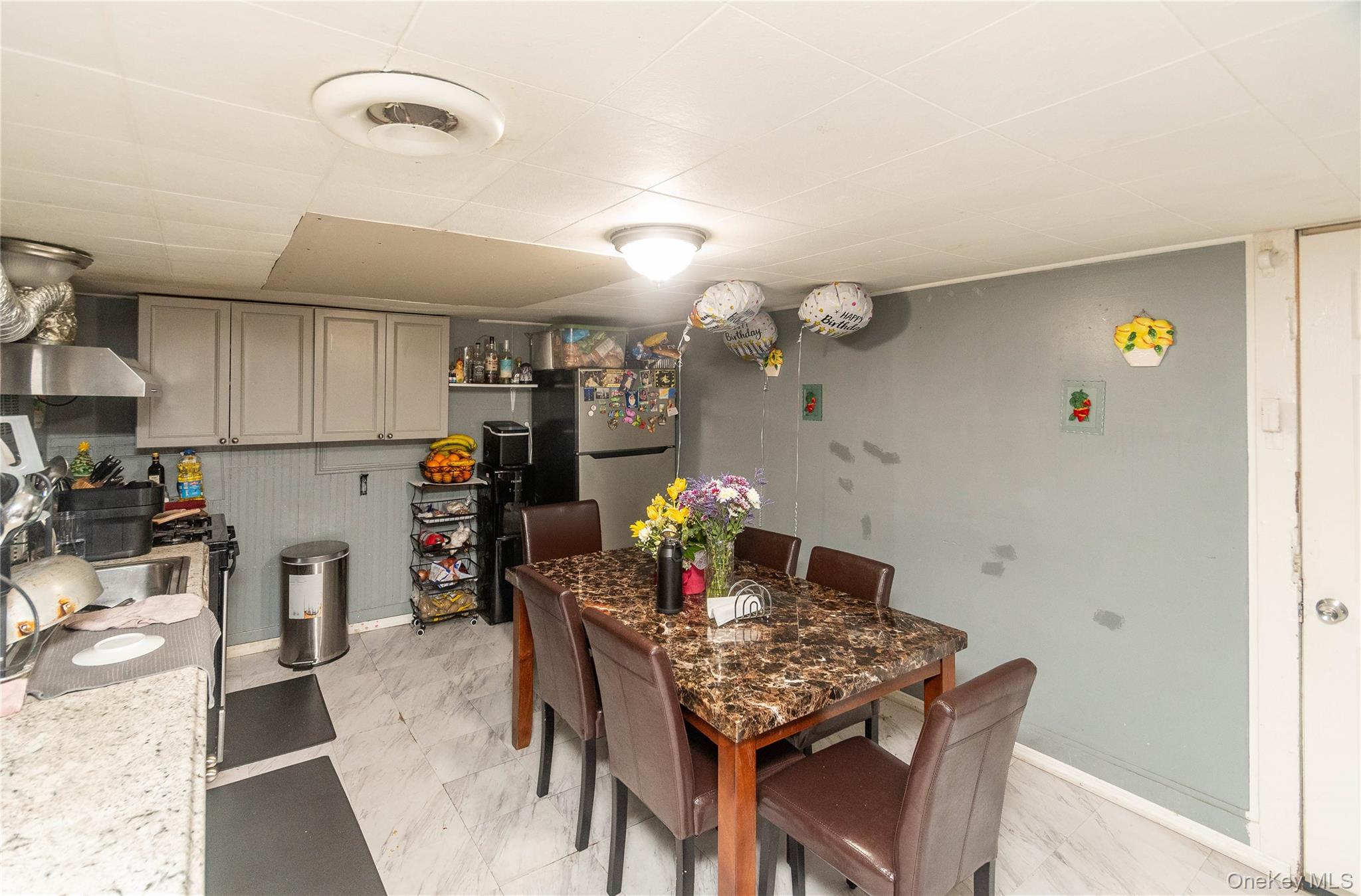 46 Hasbrouck Street Newburgh, NY 12550 - Photo 20 of 26 a view of a dining room with furniture