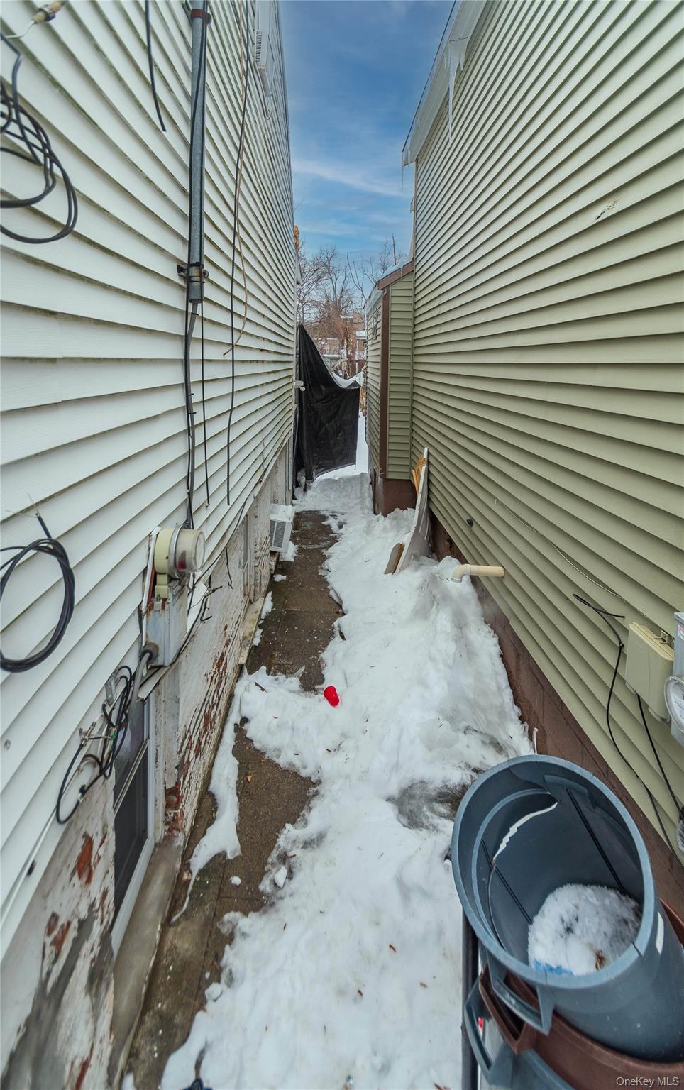 46 Hasbrouck Street Newburgh, NY 12550 - Photo 23 of 26 a bathroom with a sink and a mirror
