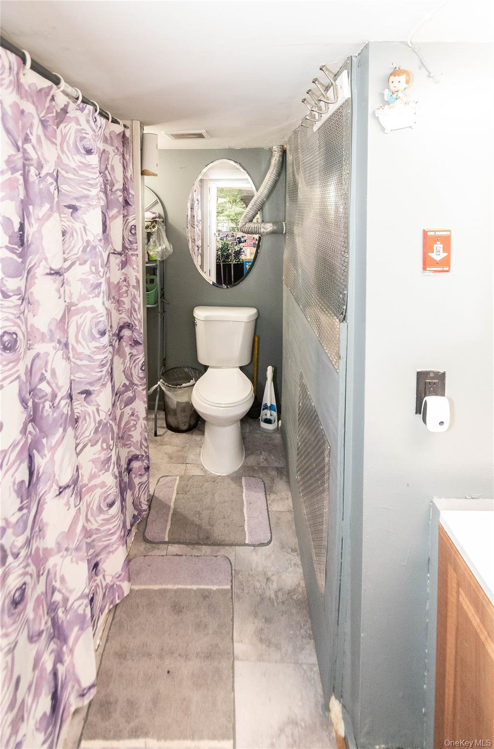 46 Hasbrouck Street Newburgh, NY 12550 - Photo 10 of 26 a bathroom with a toilet and a shower