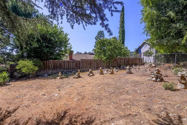 a view of a patio with a tree