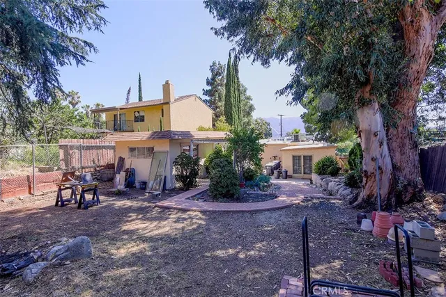 a view of a chairs and tables in the patio