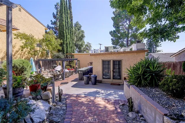 a view of a park with large trees