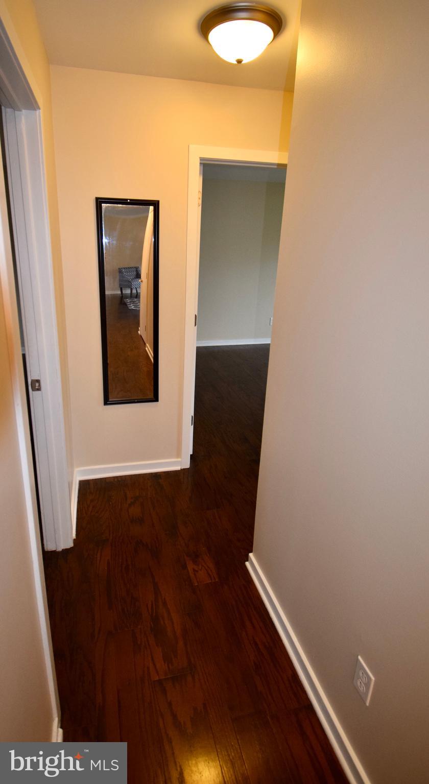 103 Silverside Road Wilmington, DE 19809 - Photo 22 of 54 Hallway to Primary Bedroom Suite