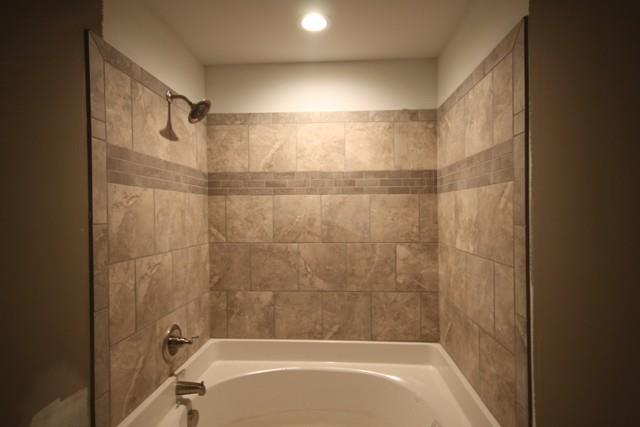 5625 Flewellyn Road Springfield, TN 37172 - Photo 12 of 13 a bathroom with a shower and a bathtub