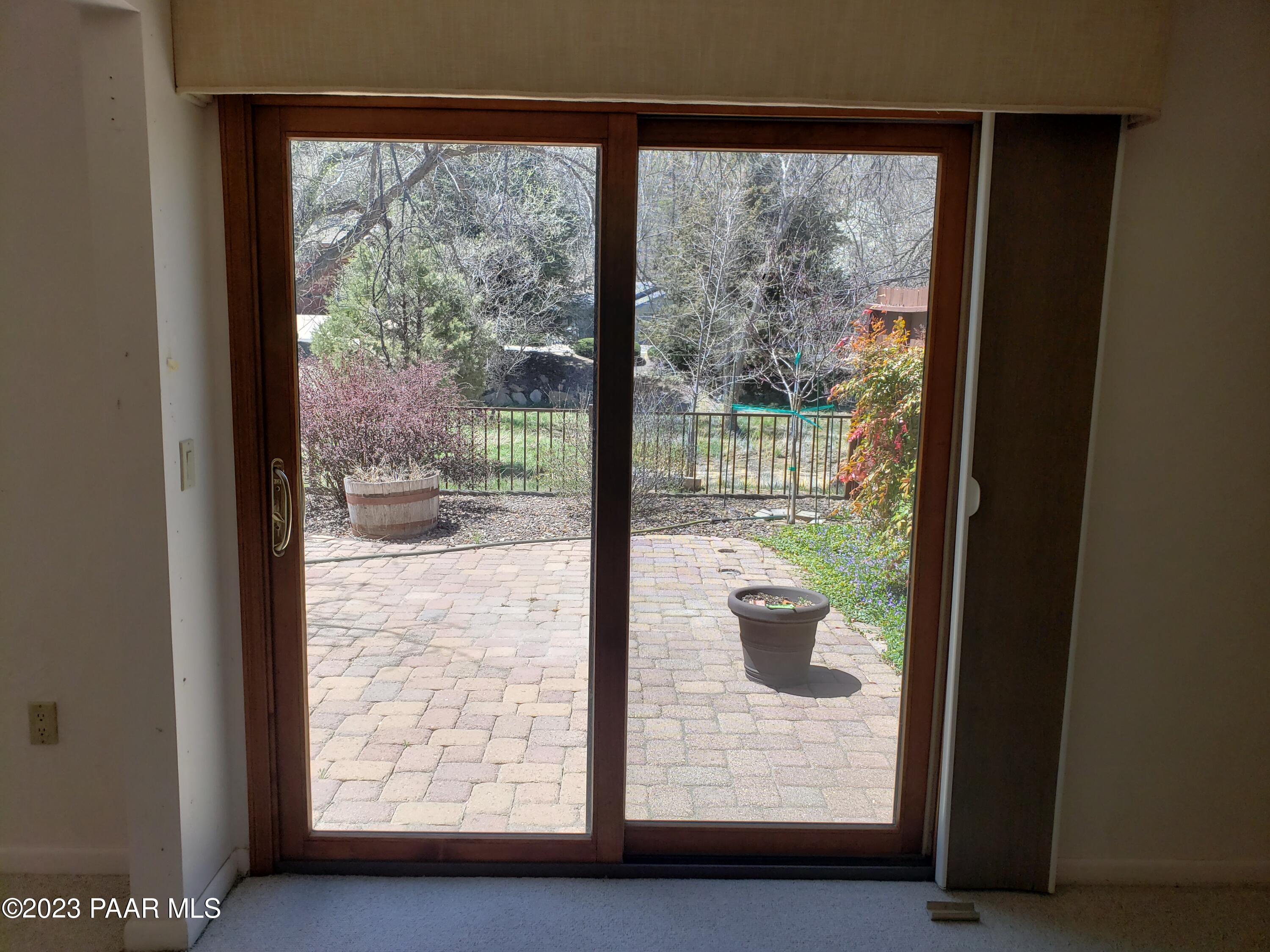 1353 Coyote Road Prescott, AZ 86303 - Photo 16 of 25 View of the yard from bedroom