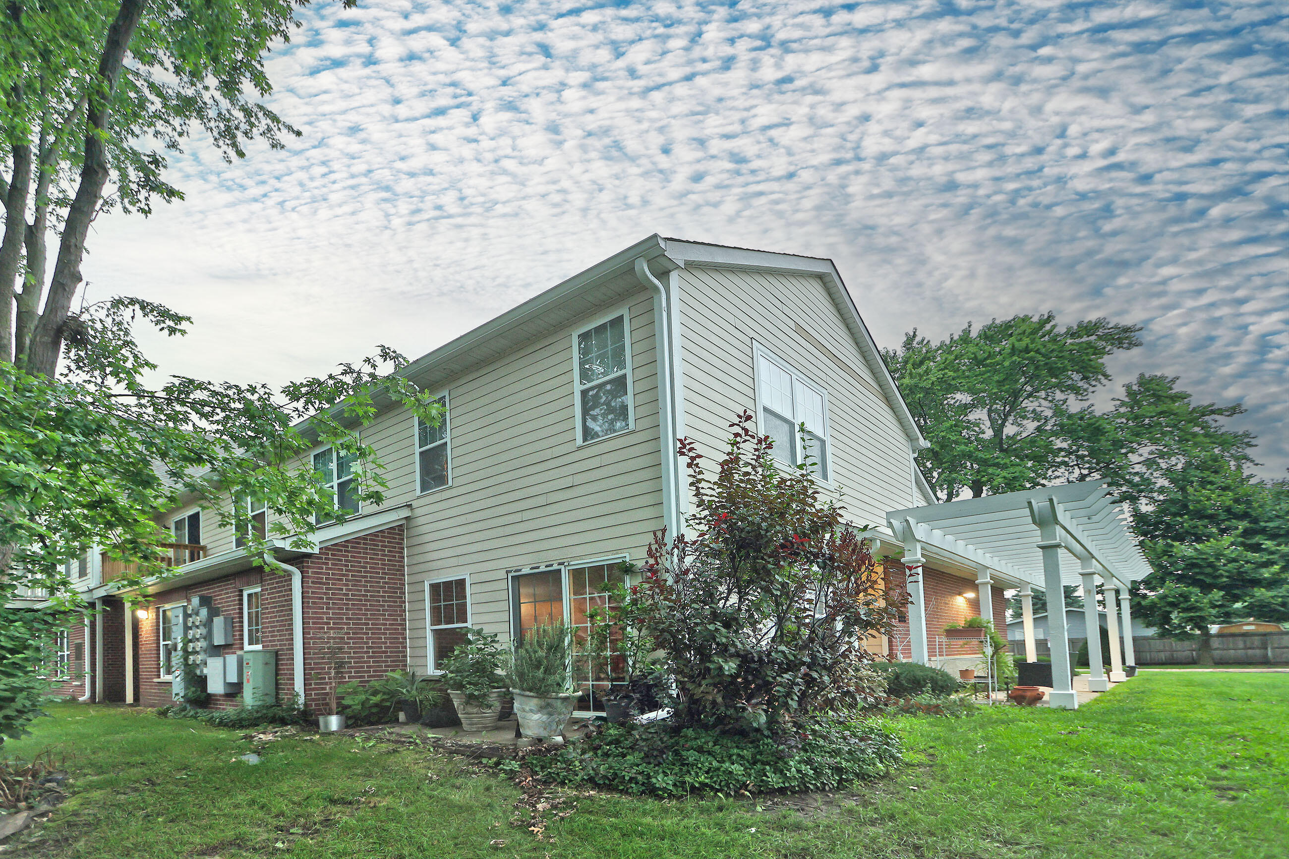 8856 Sheridan Road, Unit 1 Kenosha, WI 53143 - Photo 18 of 18 Rear Property View of Patio Area
