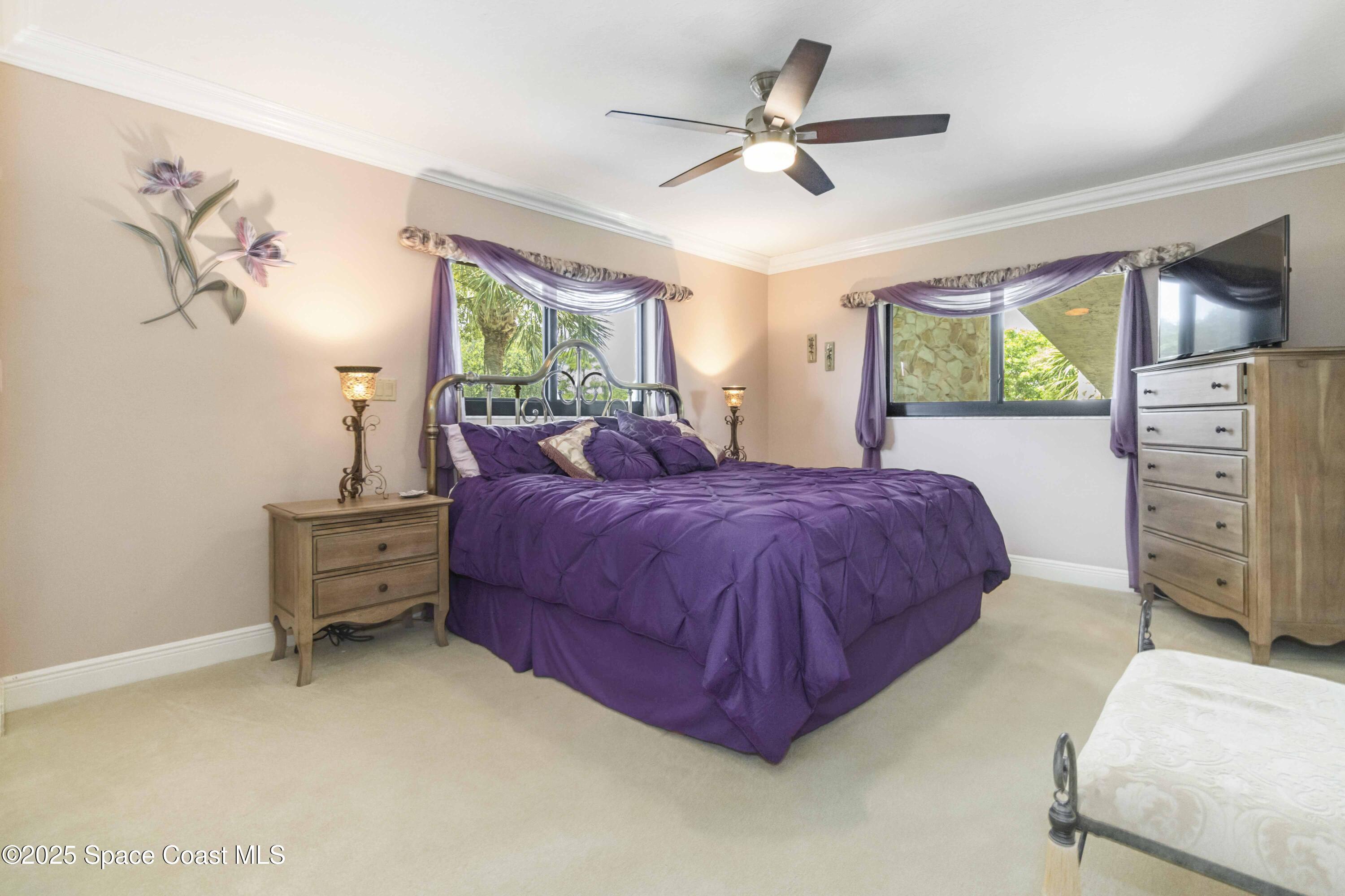 110 Barnacle Place Rockledge, FL 32955 - Photo 23 of 73 a bed room with a bed and a window