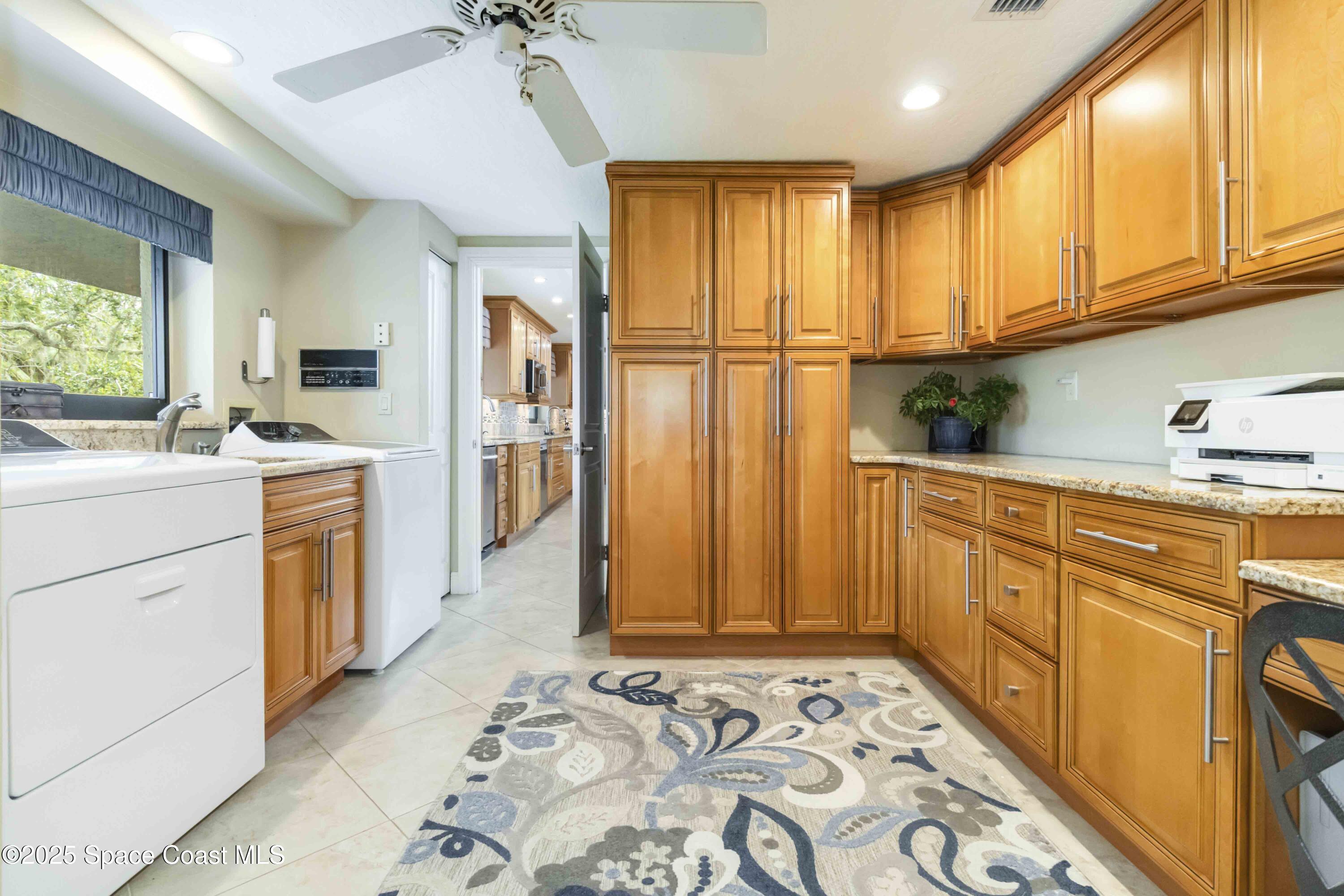 110 Barnacle Place Rockledge, FL 32955 - Photo 25 of 73 a view of a kitchen with electric appliances