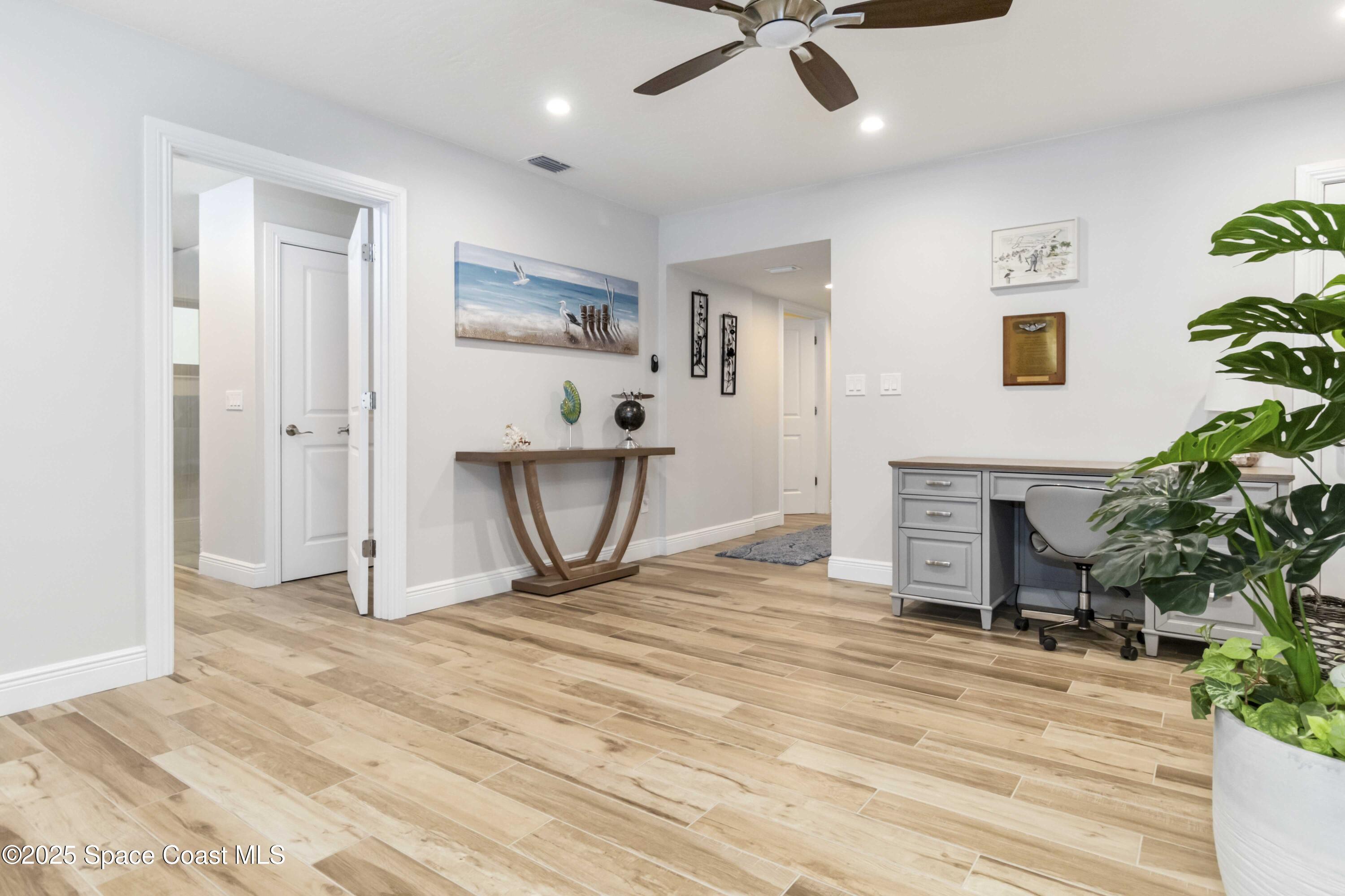 110 Barnacle Place Rockledge, FL 32955 - Photo 36 of 73 a living room with furniture and a potted plant