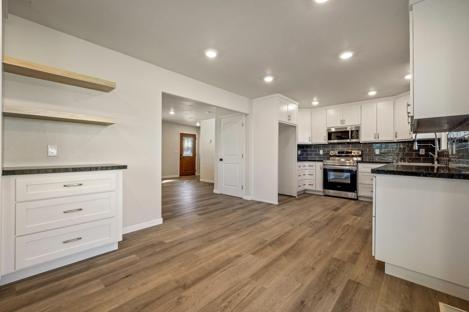 2324 Quail Hill Road Copperopolis, CA 95228 - Photo 13 of 52 a view of kitchen with wooden floor