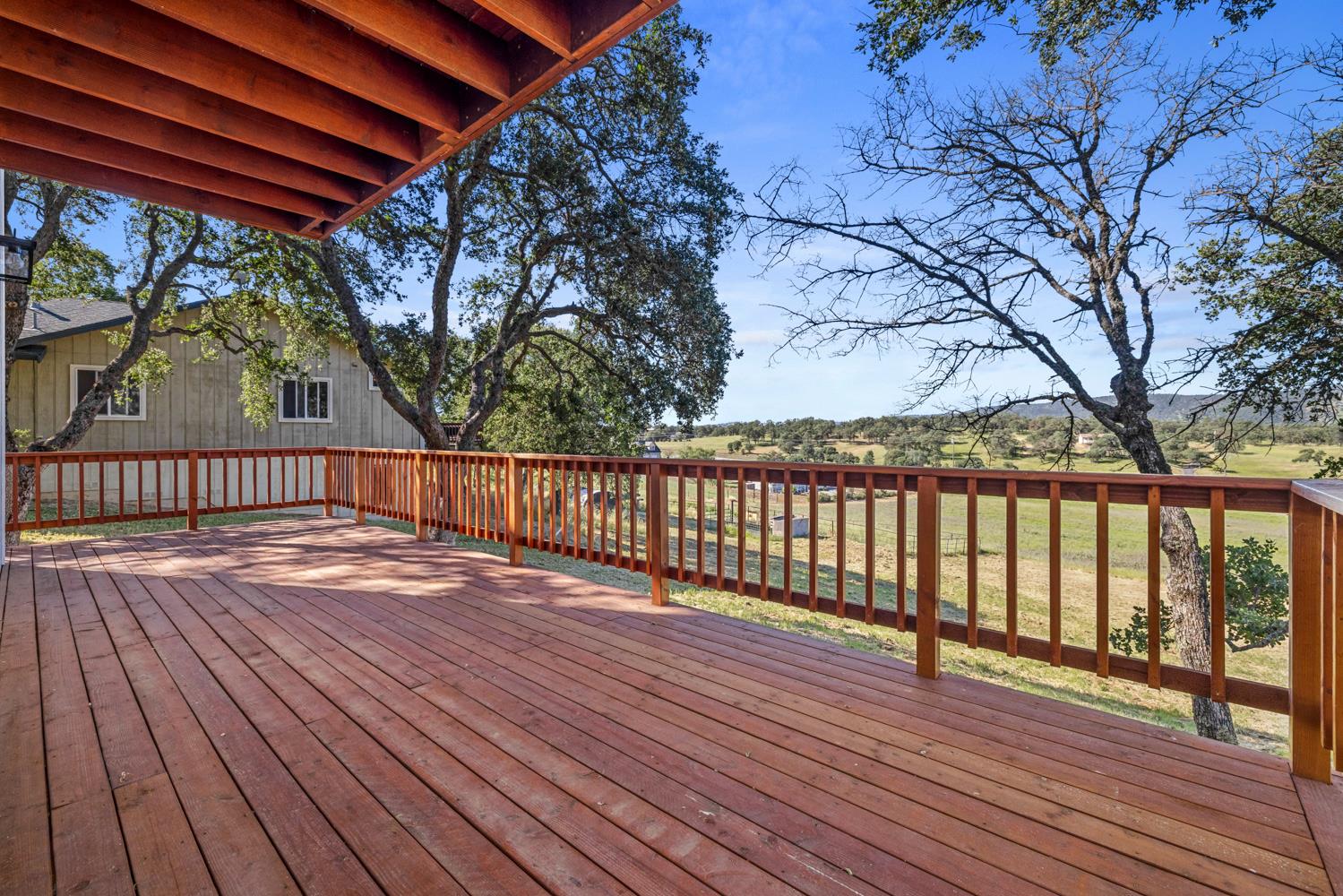 2324 Quail Hill Road Copperopolis, CA 95228 - Photo 16 of 52 a view of wooden deck on the house