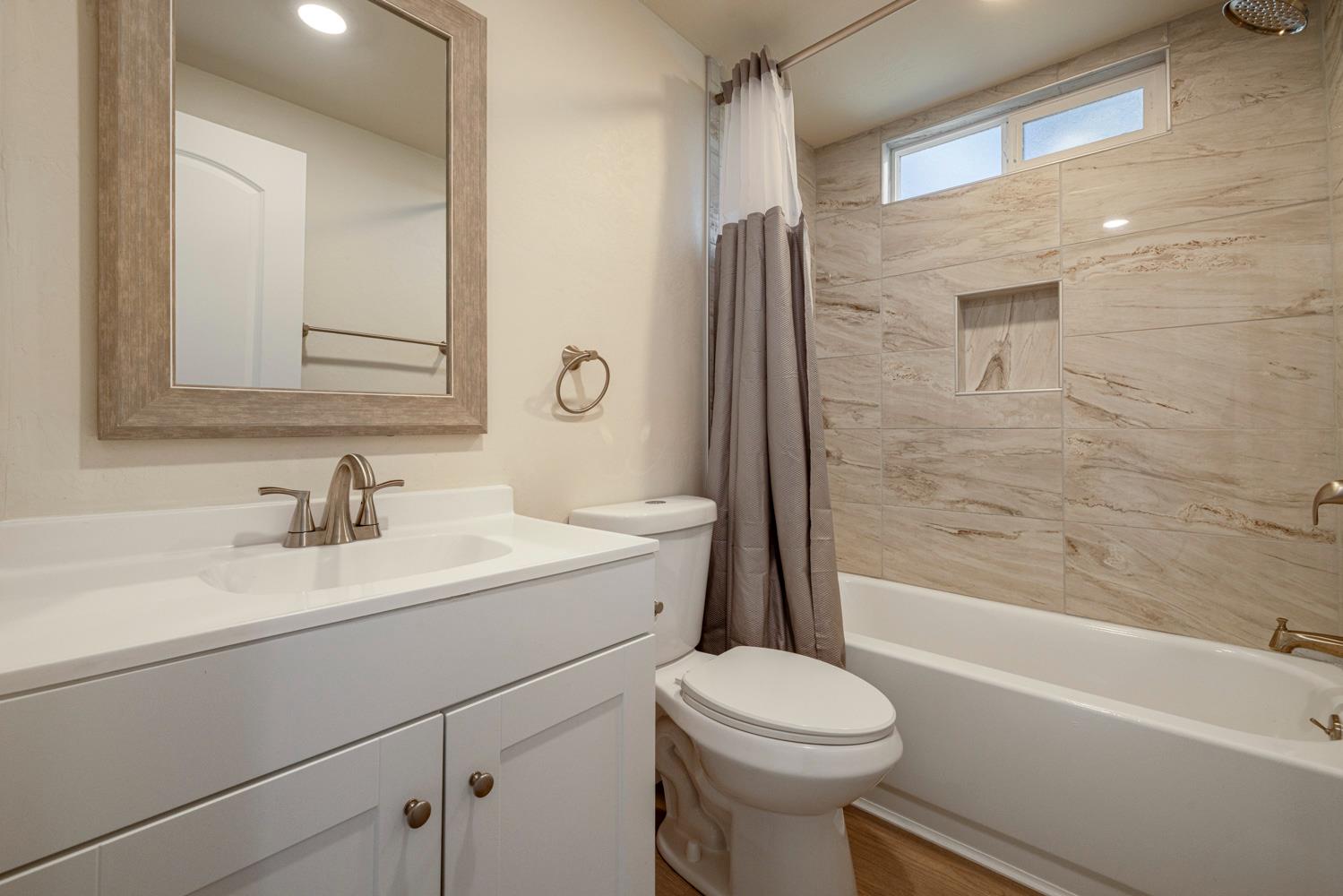2324 Quail Hill Road Copperopolis, CA 95228 - Photo 17 of 52 a bathroom with a sink a toilet and shower