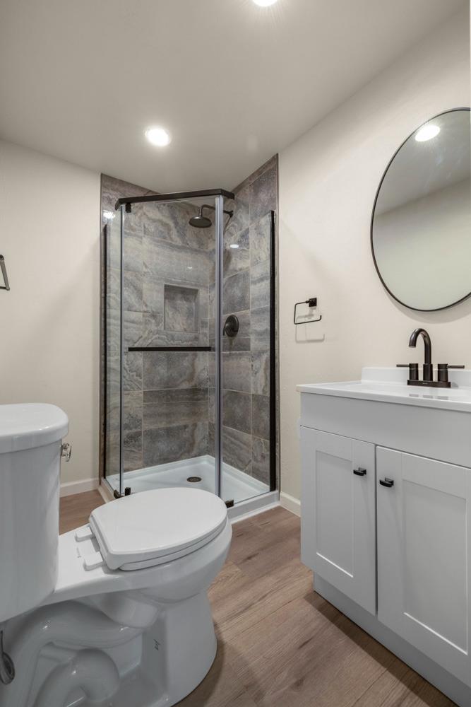 2324 Quail Hill Road Copperopolis, CA 95228 - Photo 22 of 52 a bathroom with a sink toilet and shower