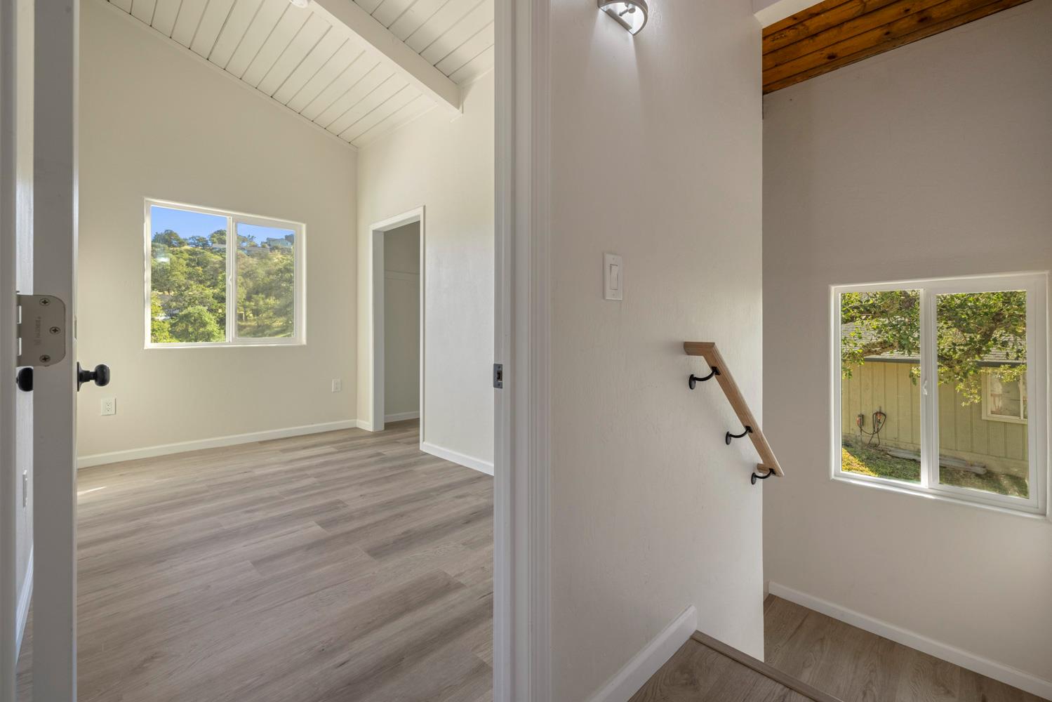 2324 Quail Hill Road Copperopolis, CA 95228 - Photo 32 of 52 a view of an empty room with a window