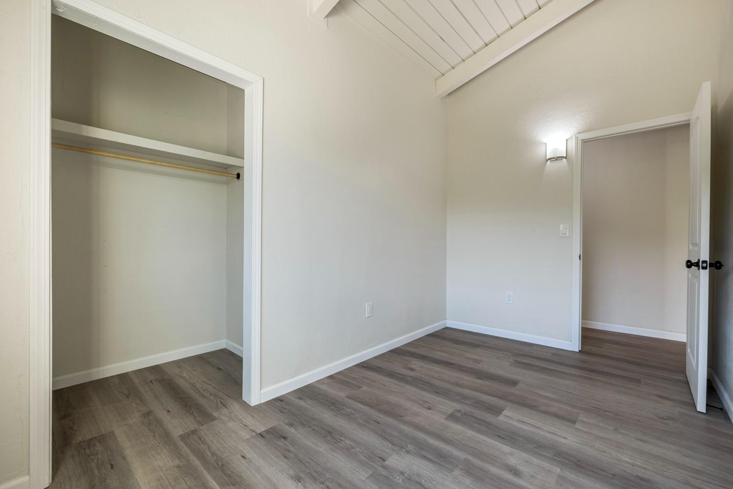 2324 Quail Hill Road Copperopolis, CA 95228 - Photo 34 of 52 a view of an empty room with wooden floor