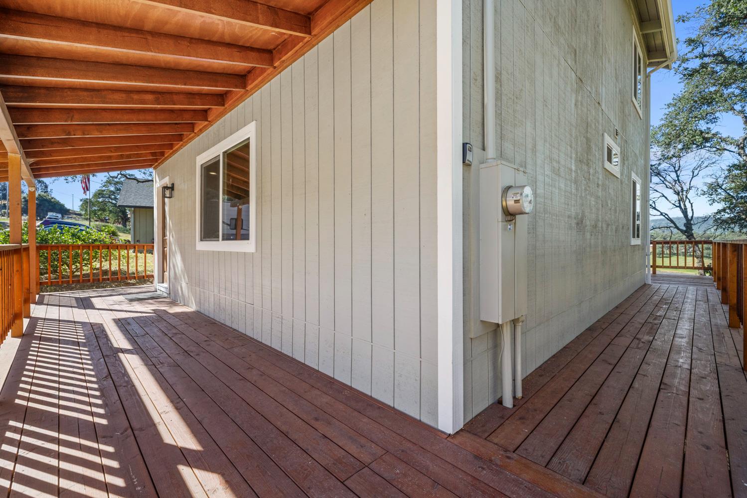2324 Quail Hill Road Copperopolis, CA 95228 - Photo 41 of 52 a view of a balcony with wooden floor