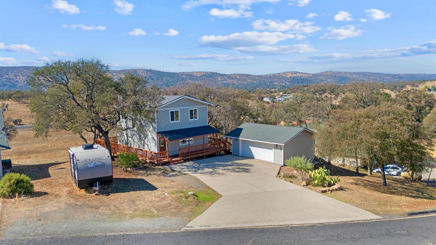 2324 Quail Hill Road Copperopolis, CA 95228 - Photo 49 of 52 an aerial view of a house with a yard