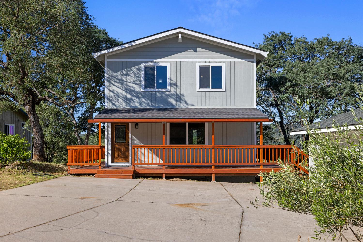 2324 Quail Hill Road Copperopolis, CA 95228 - Photo 51 of 52 a front view of a house with a yard