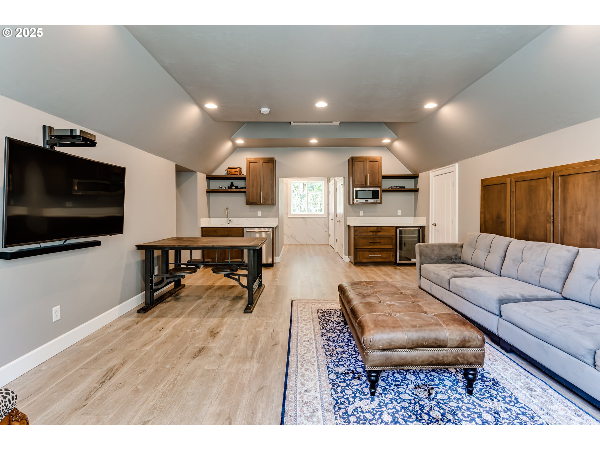 3944 Los Altos Lane Eugene, OR 97405 - Photo 32 of 47 a living room with furniture and a flat screen tv