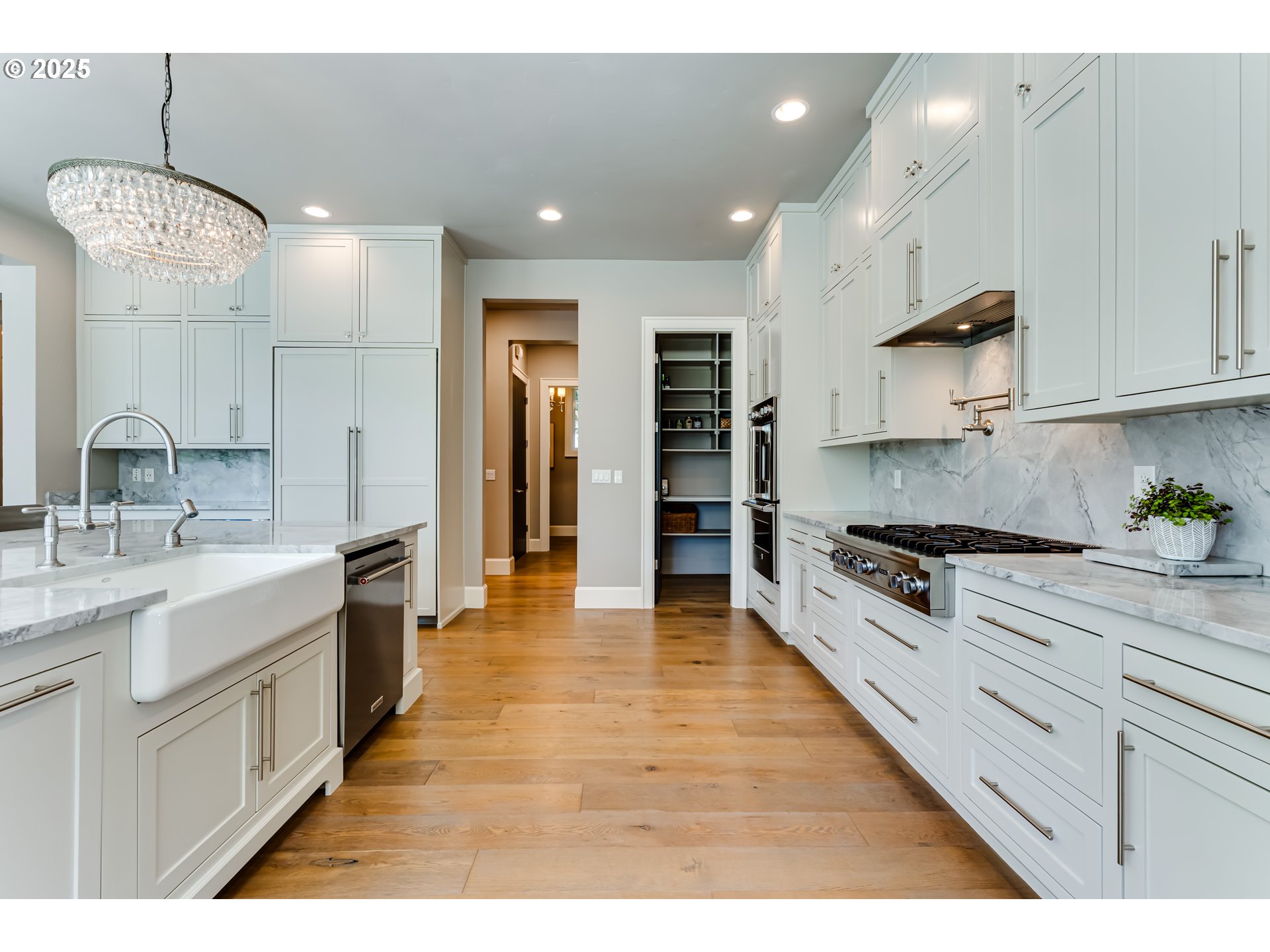 3944 Los Altos Lane Eugene, OR 97405 - Photo 8 of 47 a large kitchen with stainless steel appliances granite countertop a sink a stove and a refrigerator