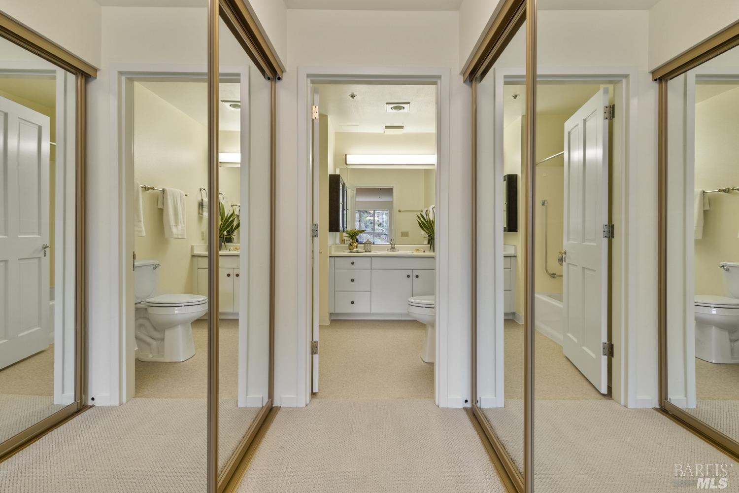 100 Thorndale Drive, Unit 303 San Rafael, CA 94903 - Photo 15 of 32 a bathroom with a glass shower door